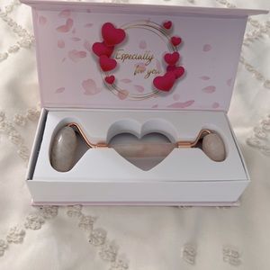 Rose quartz face roller